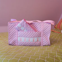 Load image into Gallery viewer, Lifestyle image of our Smocked Accessory Pouch