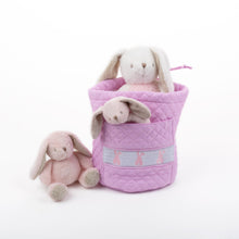 Load image into Gallery viewer, Lifestyle image of our Pink Bunny Smocked Ditty Bag
