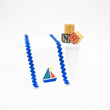 Load image into Gallery viewer, Lifestyle view of our Ric Rac Icon Burp Cloth