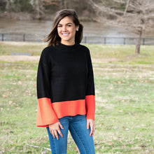 Load image into Gallery viewer, Lifestyle view of our Coral Color Block Sweater
