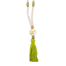 Load image into Gallery viewer, Natural wood bead necklace with lime tassel featuring a large ceramic bead in the center