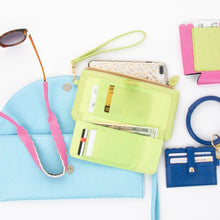 Load image into Gallery viewer, Lifestyle view of our Green Lizard Downtown Wallet