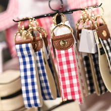 Load image into Gallery viewer, Lifestyle view of our Gingham Key Fobs