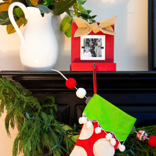 Load image into Gallery viewer, Lifestyle view of our Red Stocking Holder Frame
