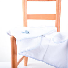 Load image into Gallery viewer, Lifestyle view of our Blue Whale French Knot Hooded Towel