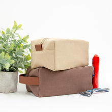 Load image into Gallery viewer, Lifestyle view of our Mocha and Tan Kentucky Dopp Kits