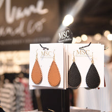 Load image into Gallery viewer, Lifestyle view of our Pebble Grain Teardrop Earrings