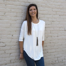 Load image into Gallery viewer, Model wearing the pearl necklace with tan leather tassel