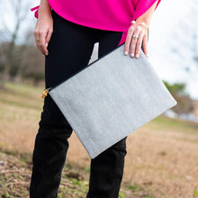 Load image into Gallery viewer, Lifestyle view of our Black Bamboo Tassel Pouch