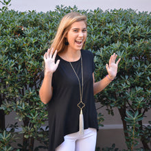 Load image into Gallery viewer, Lifestyle view of our Spring Quatrefoil Tassel Necklace