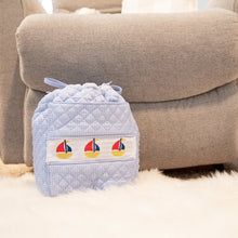 Load image into Gallery viewer, Lifestyle image of our Navy Boat Smocked Ditty Bag