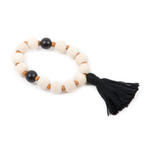 Load image into Gallery viewer, Top view of our Black Spring Tassel Bracelet
