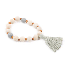 Load image into Gallery viewer, Top view of our Gray Spring Tassel Bracelet
