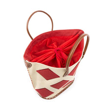 Load image into Gallery viewer, Top view of red diamond straw tote, showing the drawstring lining.