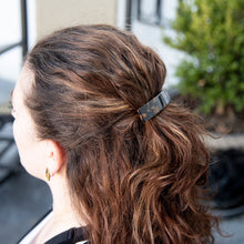Load image into Gallery viewer, Lifestyle view of our Long Tortoise Hair Barrette
