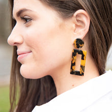 Load image into Gallery viewer, Lifestyle view of our Tortoise Rectangle Earrings
