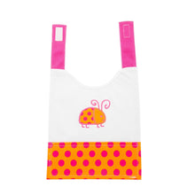 Load image into Gallery viewer, Front view of our Orange Ladybug Girl Vinyl Pocket Bib