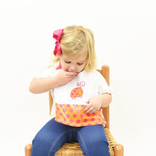 Load image into Gallery viewer, Lifestyle view of our Vinyl Pocket Bib