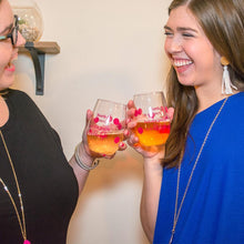 Load image into Gallery viewer, Two models toasting with acrylic wine glasses