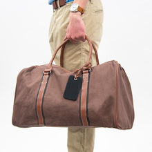 Load image into Gallery viewer, Lifestyle view of our Black Men Luggage Tag
