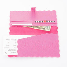 Load image into Gallery viewer, Lifestyle view of our Pink Lizard Scallop Travel Wallet
