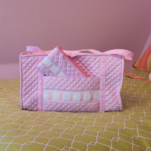 Load image into Gallery viewer, Lifestyle image of our Smocked Accessory Pouch
