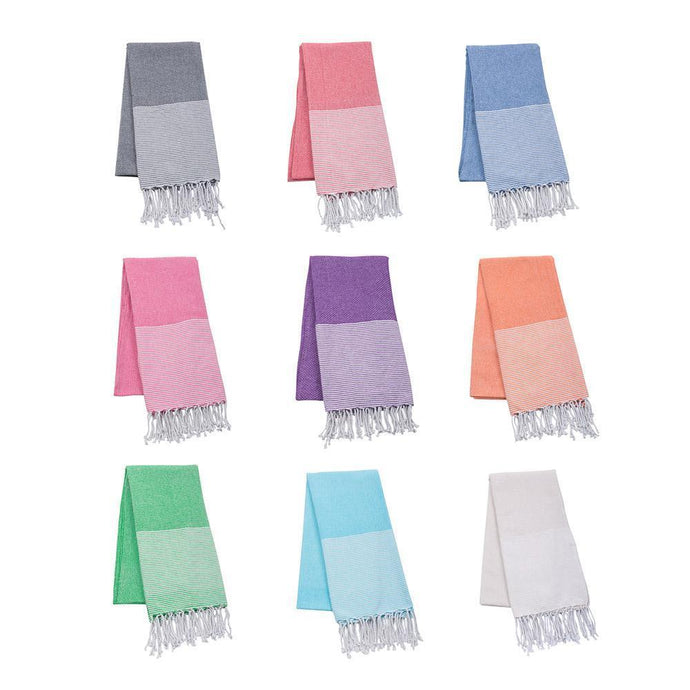 all 9 colors of the solid beach towel with stripes and fringe