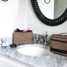 Load image into Gallery viewer, Lifestyle of our Herringbone Cosmetic Pouch with matching Train Case
