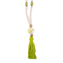 Load image into Gallery viewer, Natural wood bead necklace with lime tassel featuring a large ceramic bead in the center

