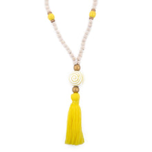 Load image into Gallery viewer, Natural wood bead necklace with yellow tassel featuring a large ceramic bead in the center
