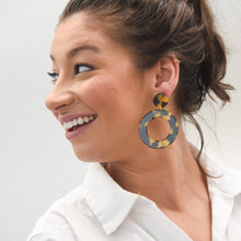 Load image into Gallery viewer, Lifestyle view of our Tortoise Circle Earrings
