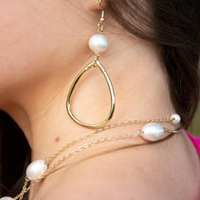 Load image into Gallery viewer, Lifestyle view of our Teardrop Hoop Textured Pearl Earring
