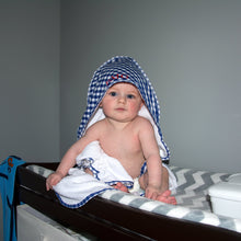 Load image into Gallery viewer, Lifestyle image of our Gingham Hooded Towel
