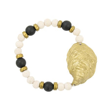 Load image into Gallery viewer, Front view of our Gold Oyster Shell Bracelet
