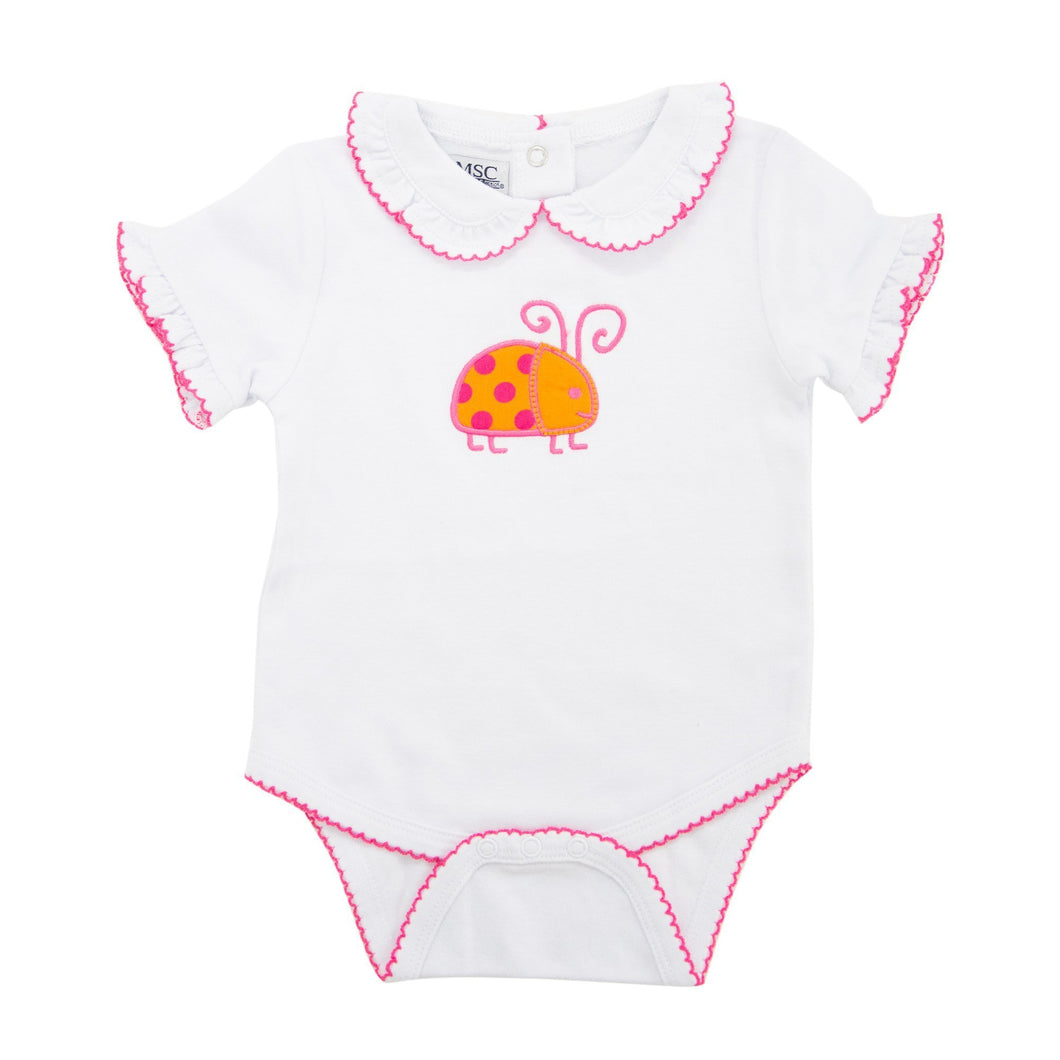 Front view of our Orange Ladybug Girl Bubble Onesie