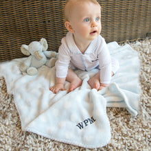 Load image into Gallery viewer, Lifestyle image of our Plush Polka Dot Blanket
