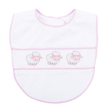 Load image into Gallery viewer, Front view of our Pink Lamb Smocked Bib
