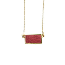 Load image into Gallery viewer, Top view of our Crimson Pebble Grain Rectangle Necklace
