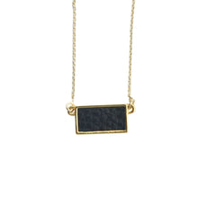 Load image into Gallery viewer, Top view of our Black Pebble Grain Rectangle Necklace
