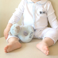 Load image into Gallery viewer, Lifestyle image of our Blue Bear Plush Rattle
