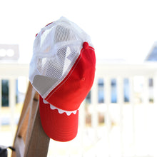 Load image into Gallery viewer, Lifestyle view of our Red Ricrac Trucker Hat
