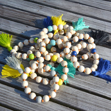 Load image into Gallery viewer, Lifestyle view of our Spring Tassel Bracelets
