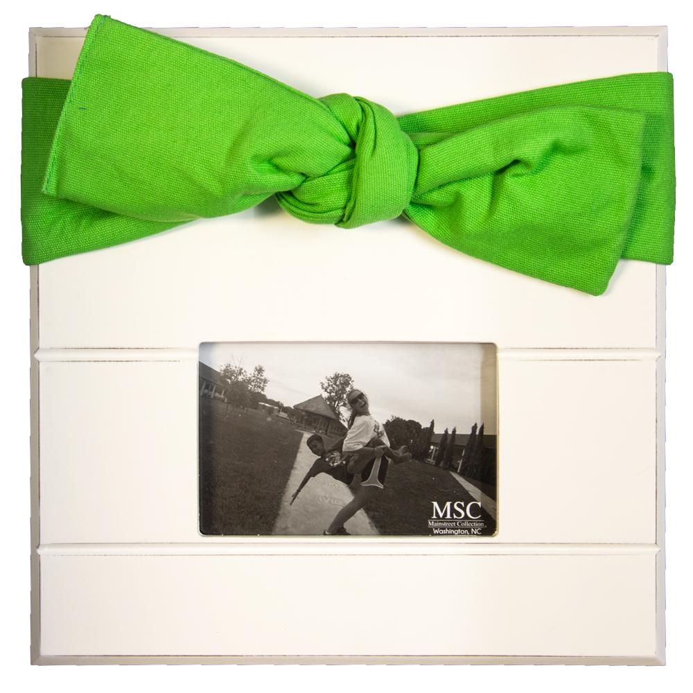 White picture frame with lime canvas bow